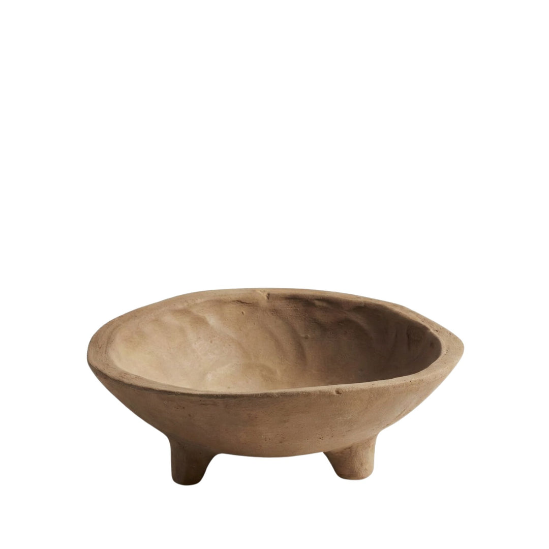 Front view of the Sula terracotta bowl with rounded shape and three small feet.