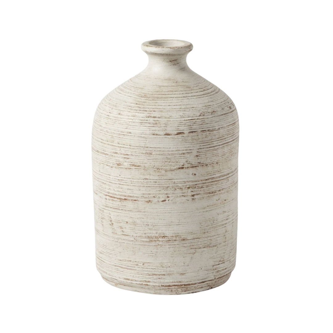 Front view of the Sula white wash terracotta vase with rounded form and handcrafted textured surface.