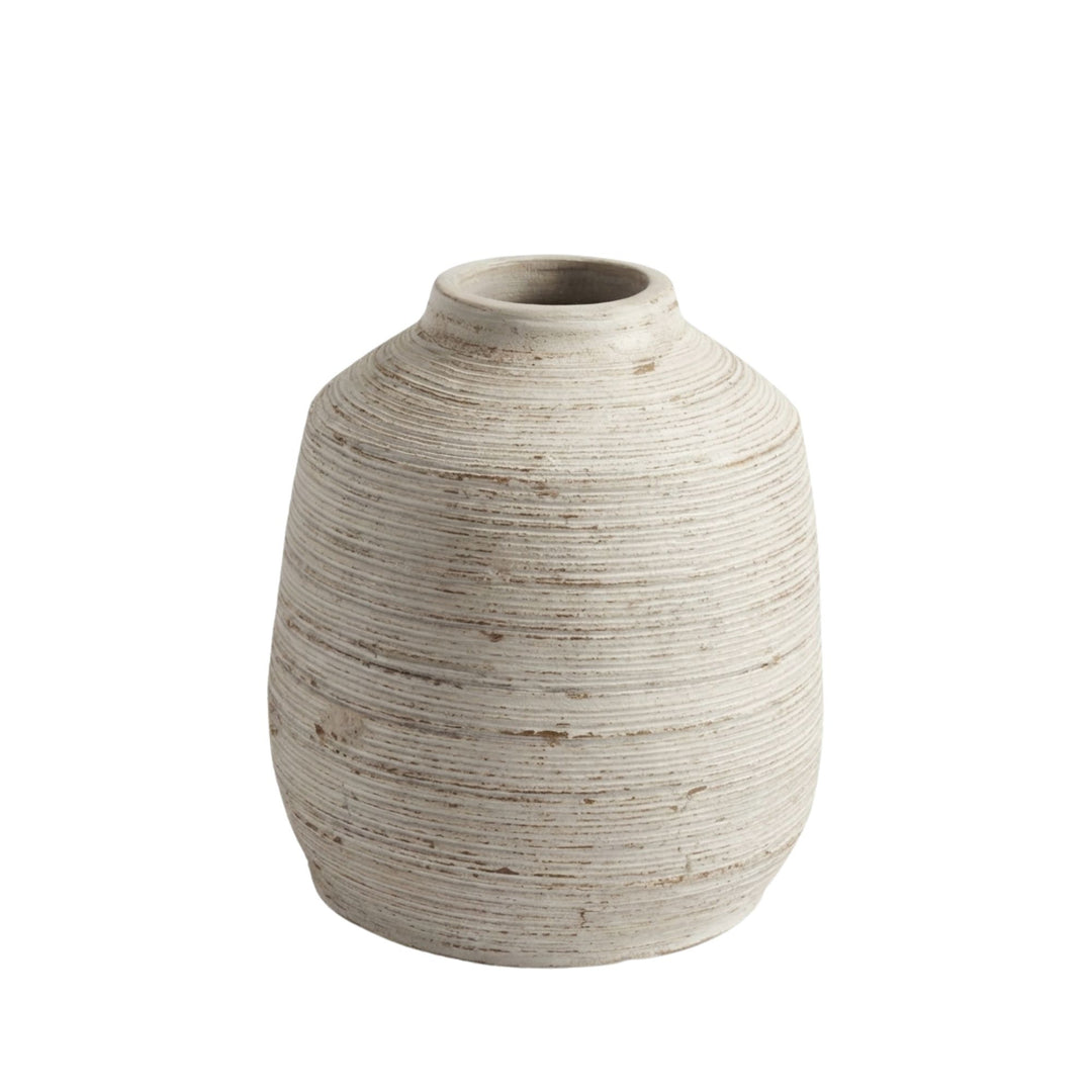 Front view of the Sula terracotta white wash vase “J” with rounded form and horizontal handcrafted texture.