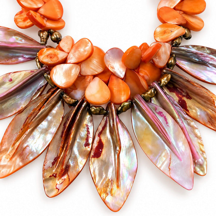Close-up of the Sunset Nacre Necklace showing iridescent mother-of-pearl details