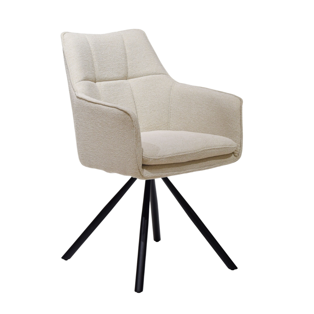 Angled view of cream Surat dining chair with upholstered seat and black legs.