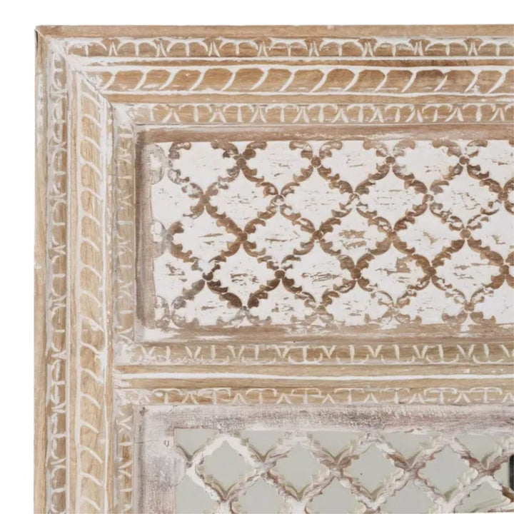 Close-up of the Surat Mirror’s carved lattice detailing.