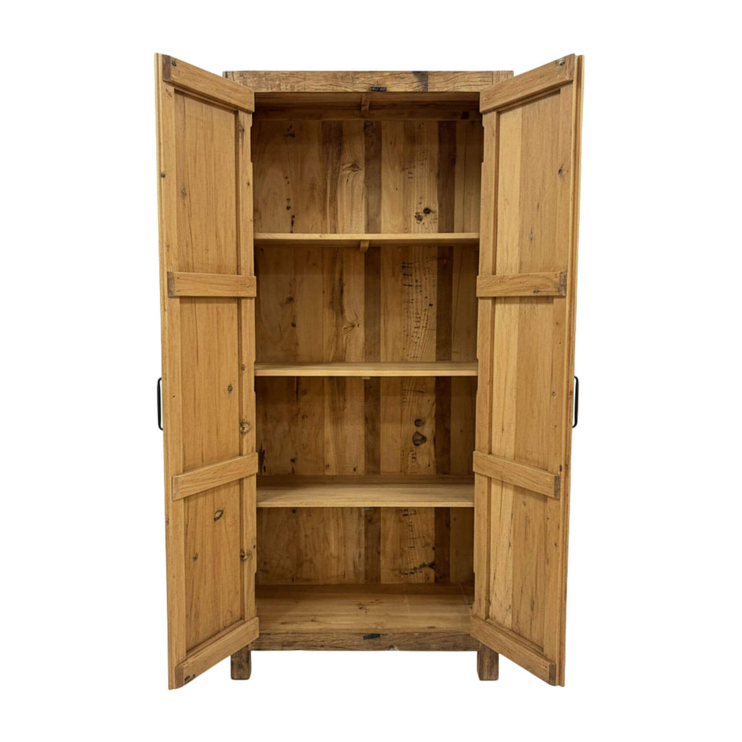 Open Suri Wardrobe showing spacious interior wooden shelves.