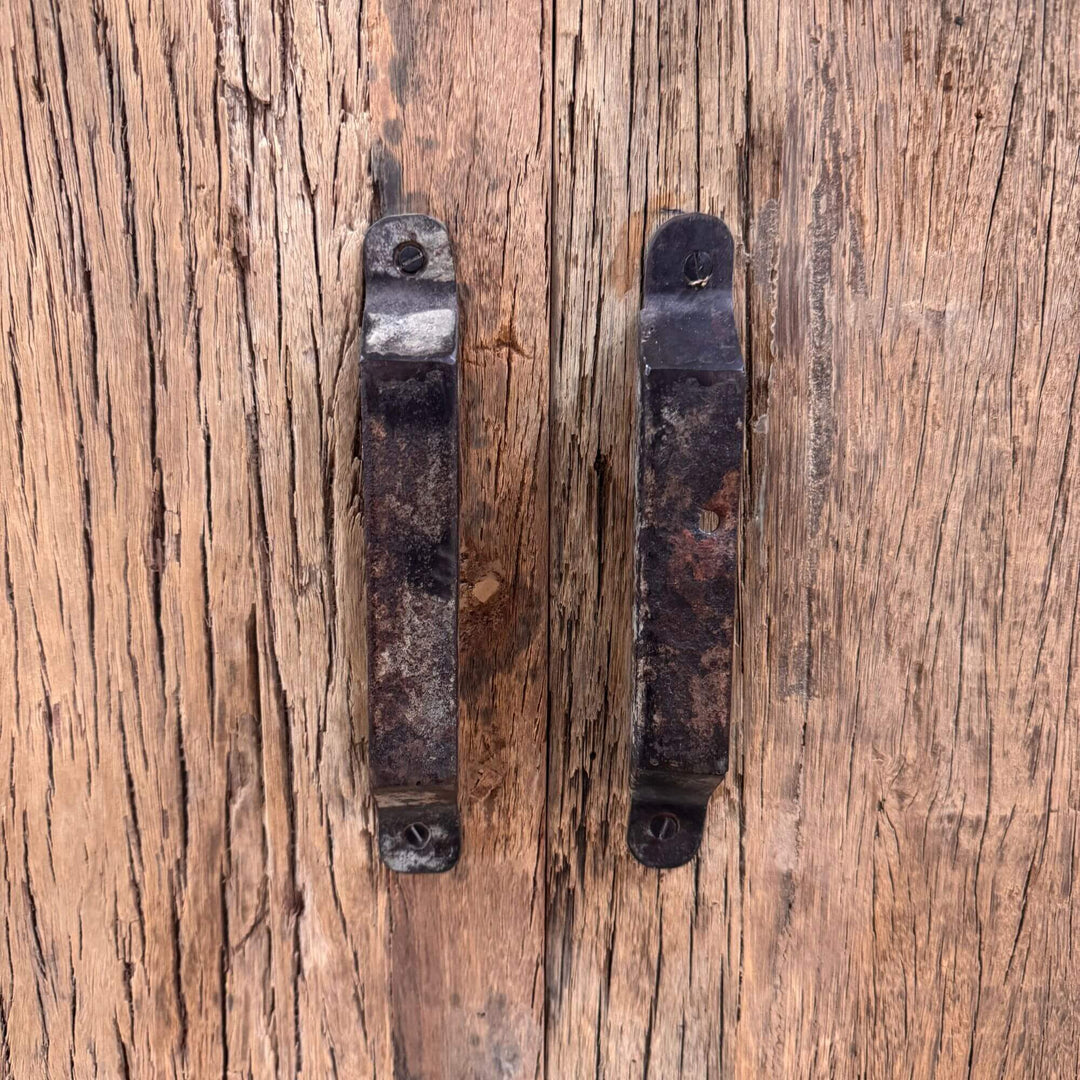 Detail of antique-style metal handles on the Suri Wardrobe doors.