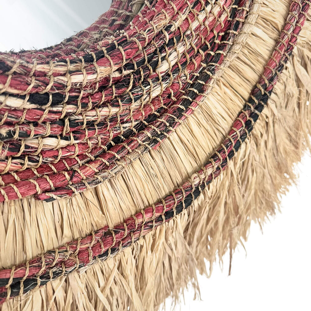 Close-up Sagara Mirror made of sisal, abaca, and cotton with a layered circular natural fiber frame, 100 cm.