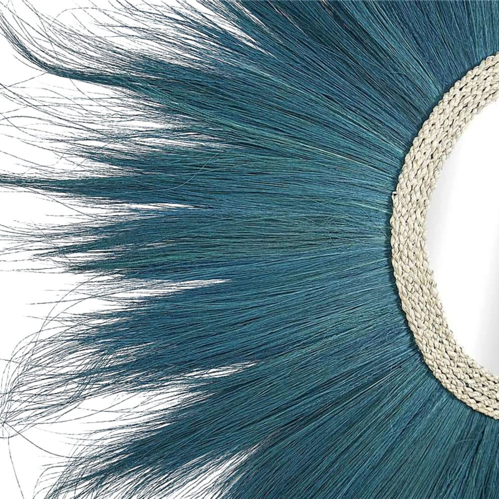 Close-up of blue natural fiber detailing on Sula Lion Mirror.