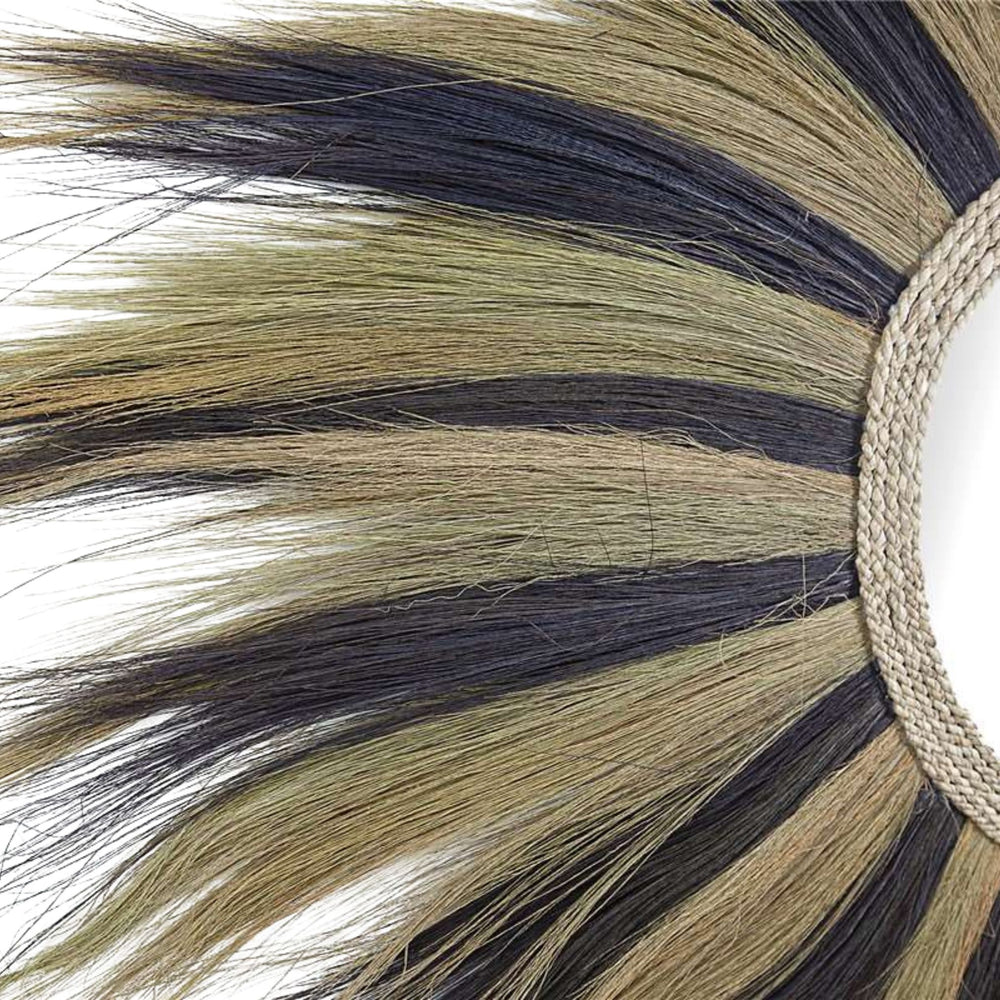 Close-up of natural and black fiber detailing on Sula Lion Mirror Mix.