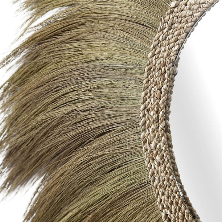 Close-up of handcrafted natural fiber detailing on Sula Lion Mirror.