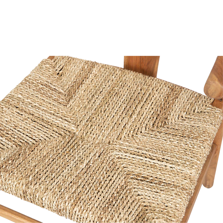 Close-up detail of seagrass seat weaving and teak wood frame