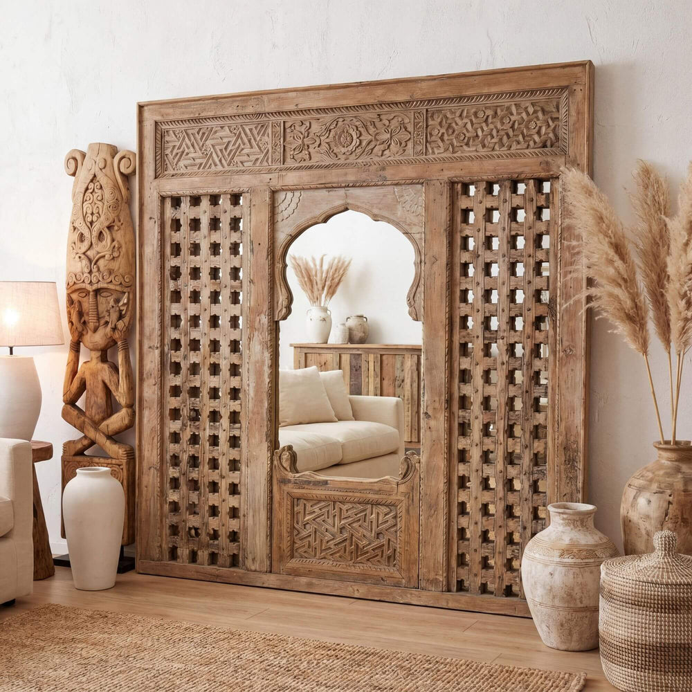 Styled interior setting featuring the Taj Indian mirror as a statement piece in a warm natural space.