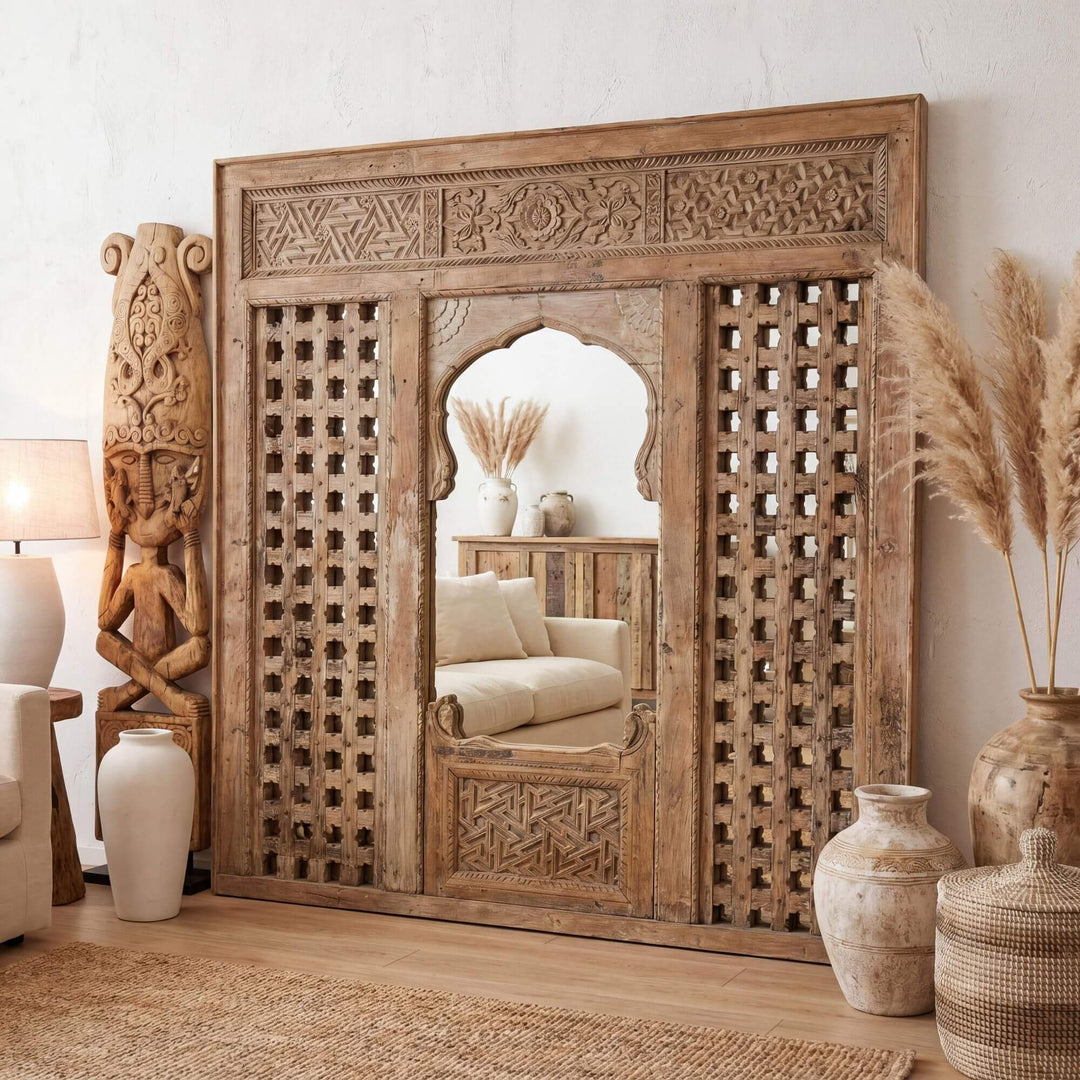 Styled interior setting featuring the Taj Indian mirror as a statement piece in a warm natural space.