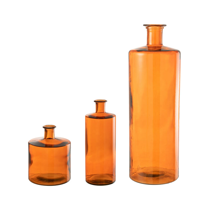 Set of Tangerine glass vases in different sizes showcasing their warm amber color.