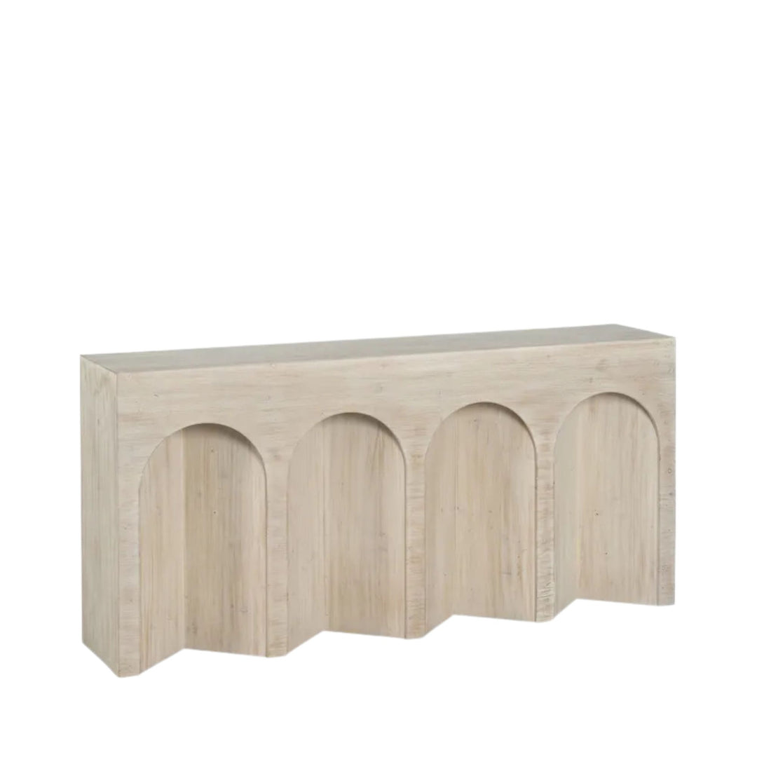 Front view of the Tarkine console showcasing its arched wood design and sculptural form.
