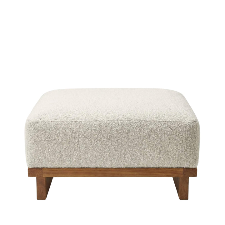 Ottoman module with upholstered cushion.