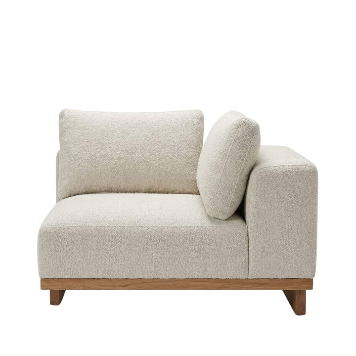 Single armrest module with thick outdoor cushion.