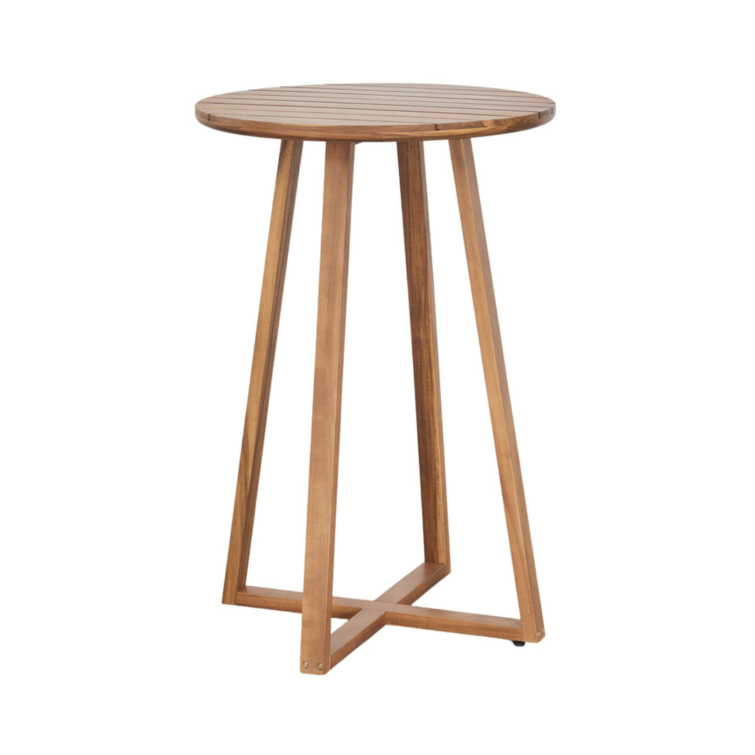 Front angled view of the Tavira acacia wood bar table with round slatted top and slender angled legs