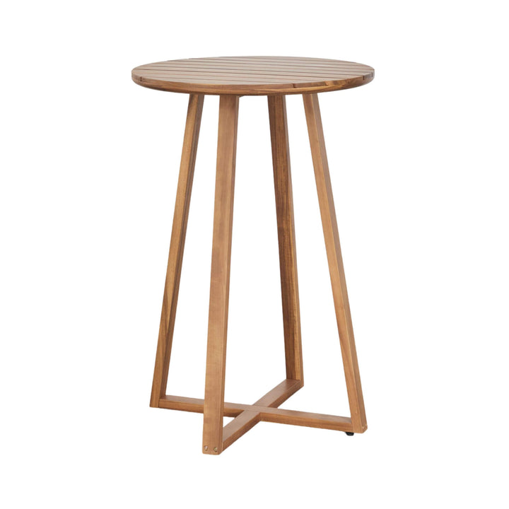 Front angled view of the Tavira acacia wood bar table with round slatted top and slender angled legs