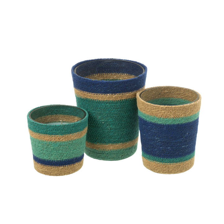 Set of Tazirit candles in natural fibers with blue and green woven bands displayed together.