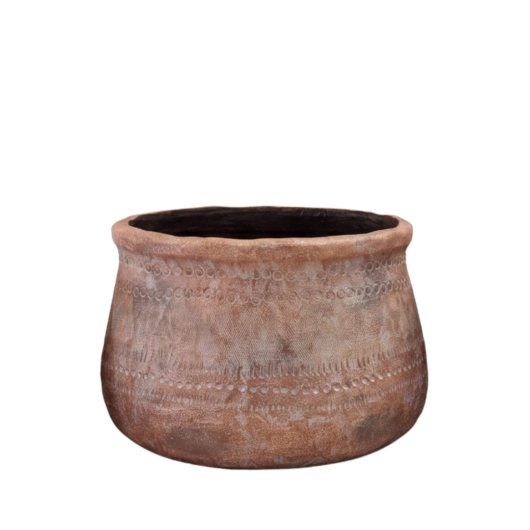 Front view of the medium planter showing its handcrafted aged finish and organic silhouette.