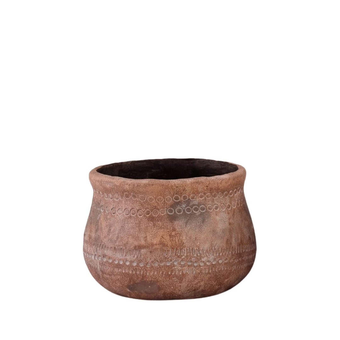 Front view of the small planter highlighting its compact rounded form and rustic texture.