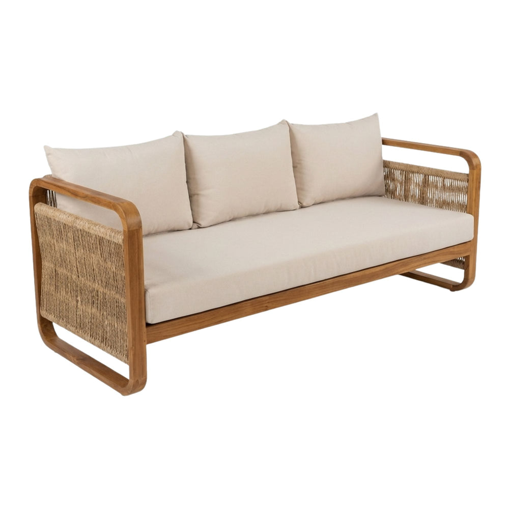 Angled view highlighting the clean lines and neutral cushions of the Thai Fiber Sofa.