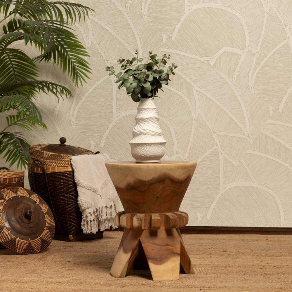 Living rooms etting with Thorne stool showing the natural grain and hand-carved finish.