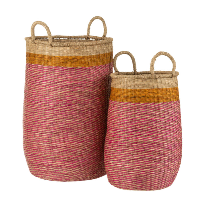 Tikolos Baskets in two sizes made from natural raffia with pink and mustard accents.