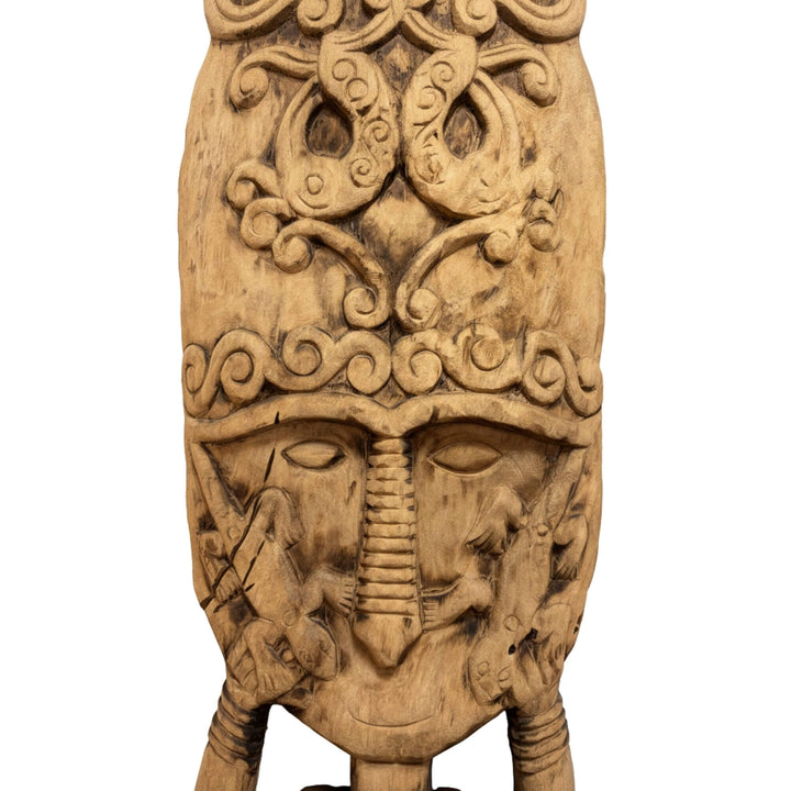 Close-up of the hand-carved details on the Timor Teak Wood Totem.