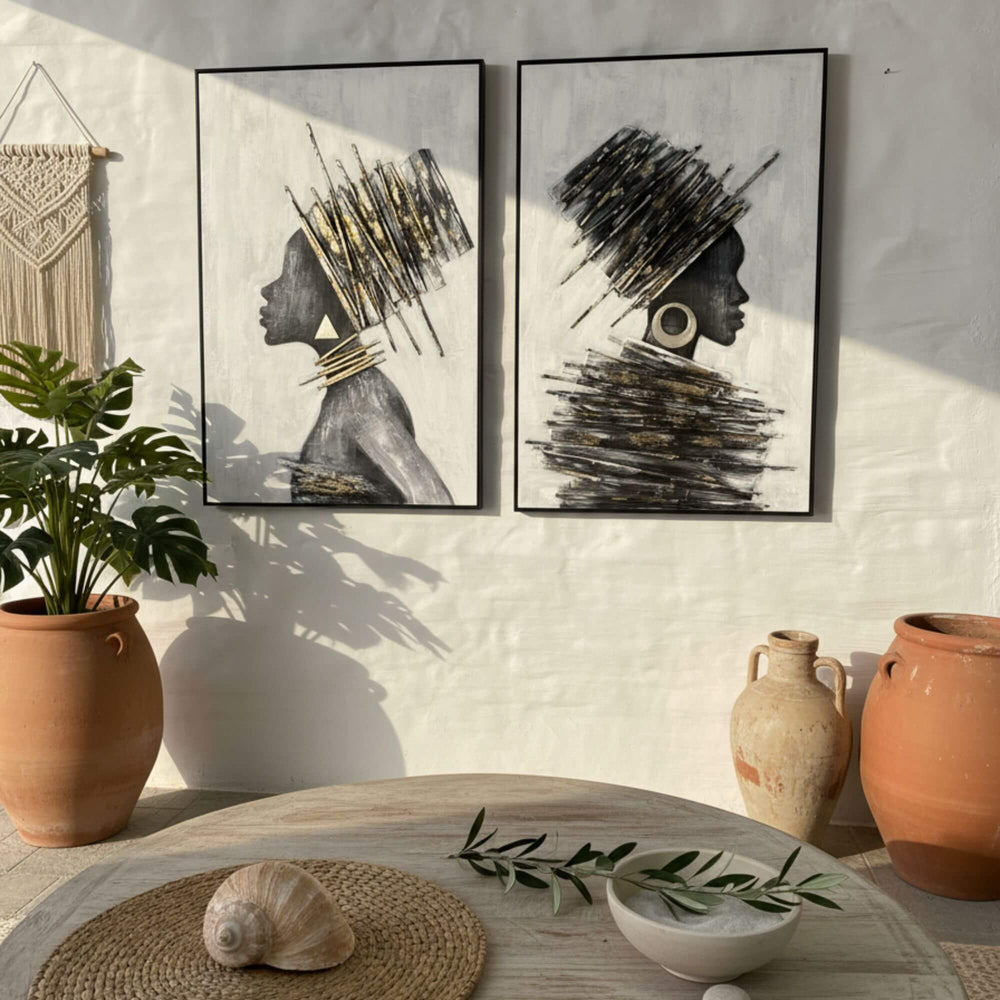 Bright living room scene featuring the Tomasa paintings paired with natural décor and coastal sunlight.