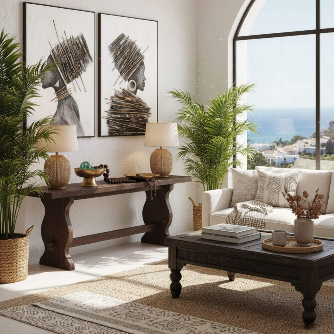 Interior setting with both Tomasa paintings displayed above a Mediterranean-style console table.