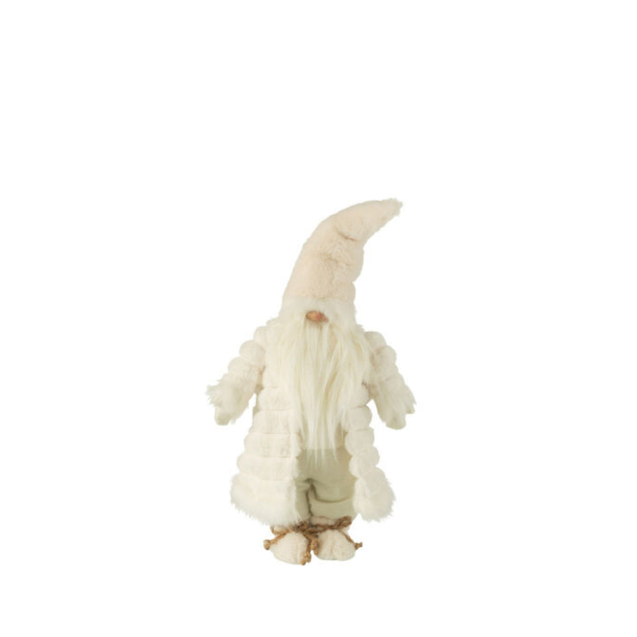 Small Tomte gnome figure in cream textile with pointed hat and fluffy coat.