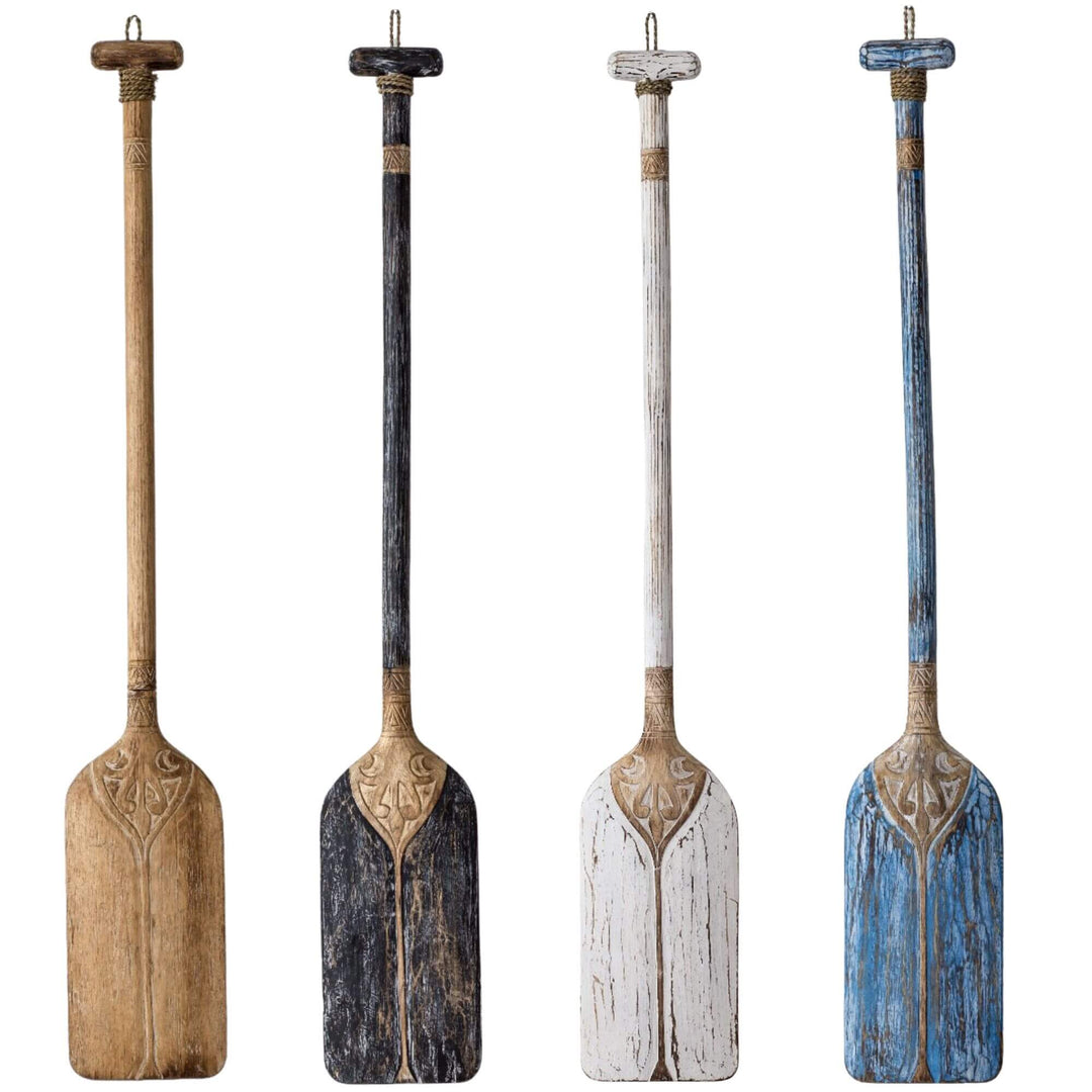 Set of four Tora Wood Paddle Wall Deco pieces in natural, black, white, and blue finishes.