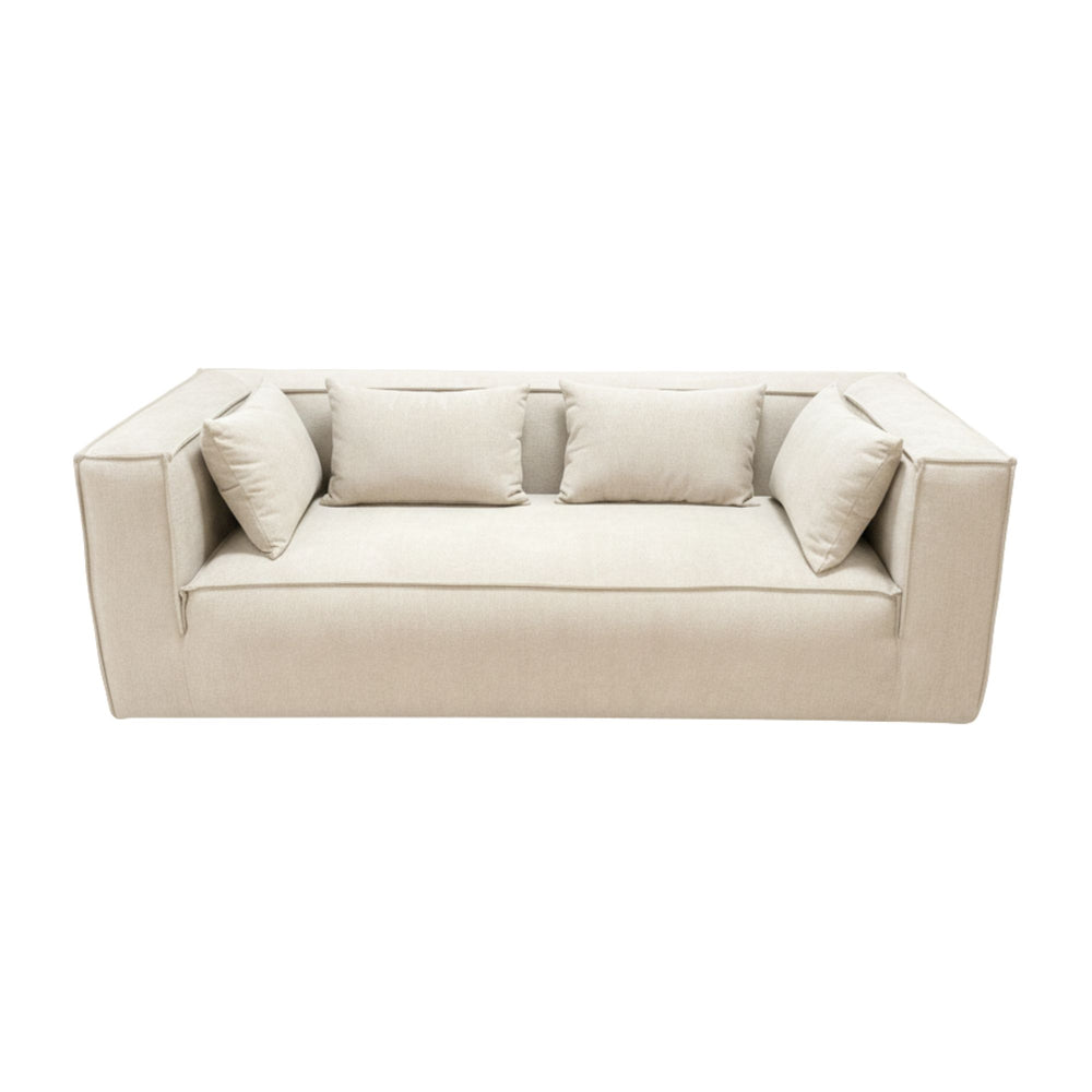 Front view of the Torino Sofa in beige fabric with included cushions.