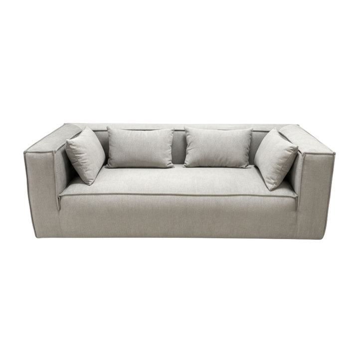 Front view of the Torino Sofa in grey fabric with included cushions.