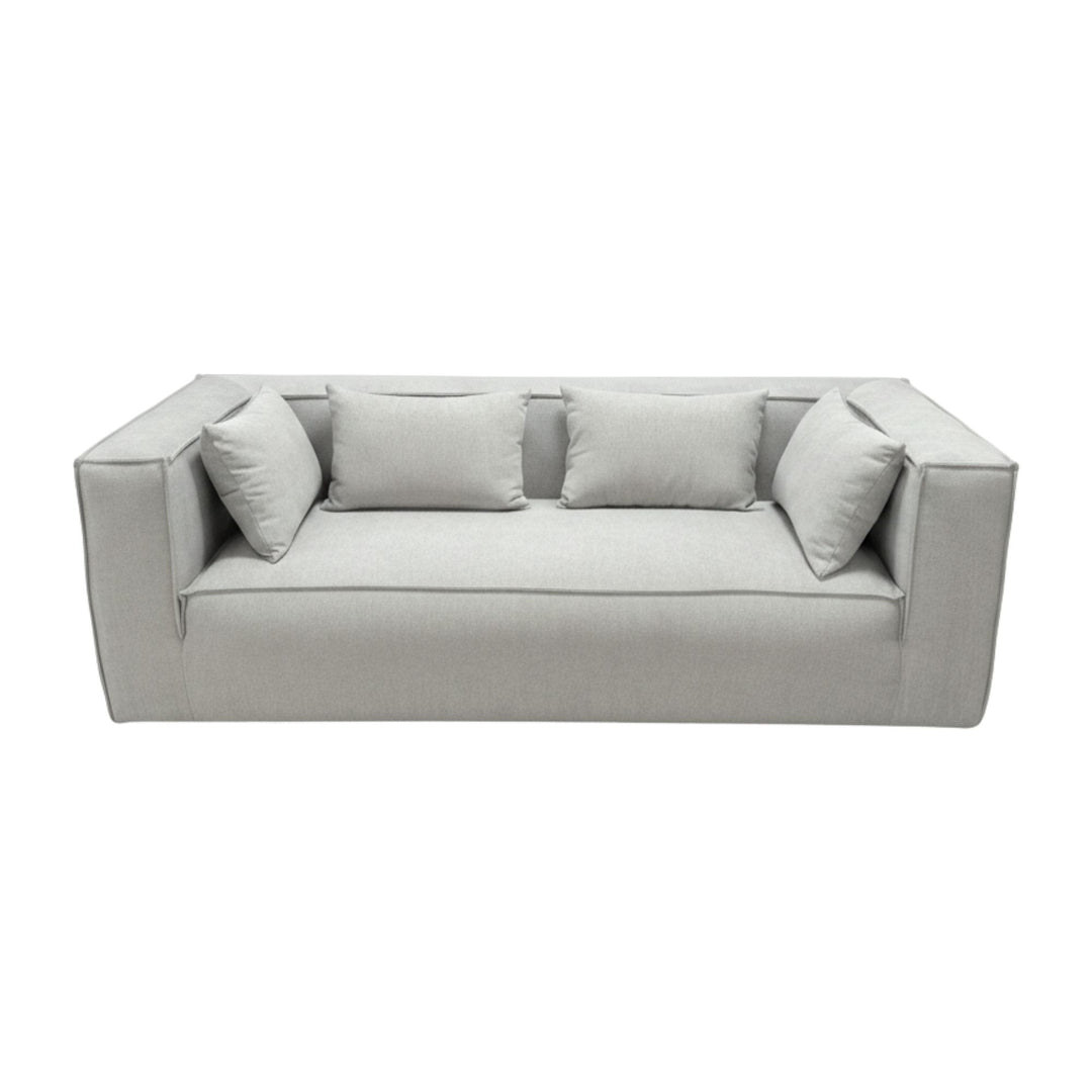 Front view of the Torino Sofa in light grey fabric with included cushions.