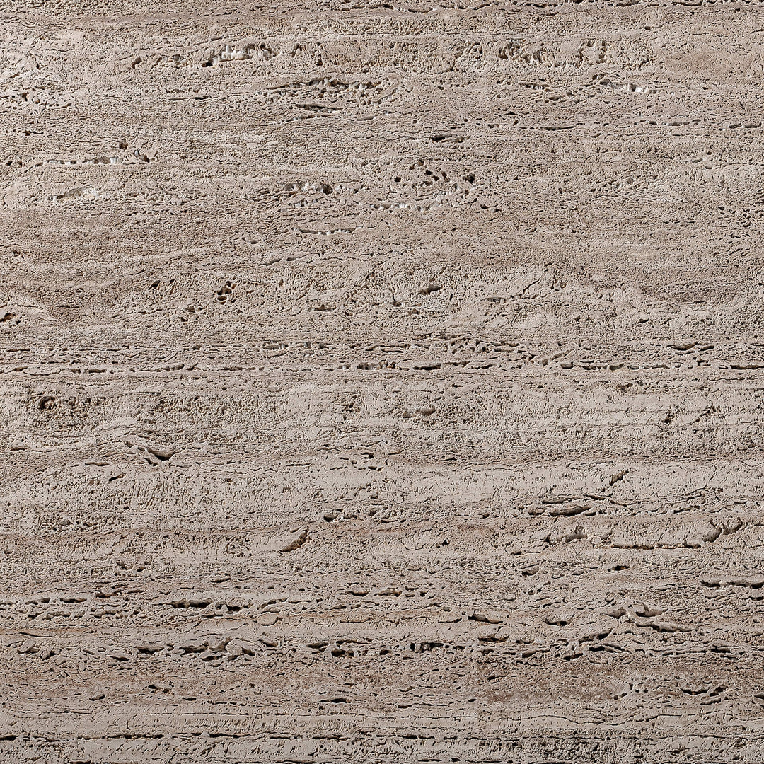 Detail shot of the travertine tabletop showing natural pores and veining.