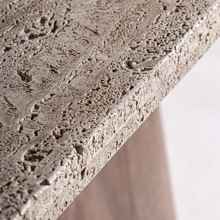 Close-up of the natural acacia wood grain on the pedestal base.