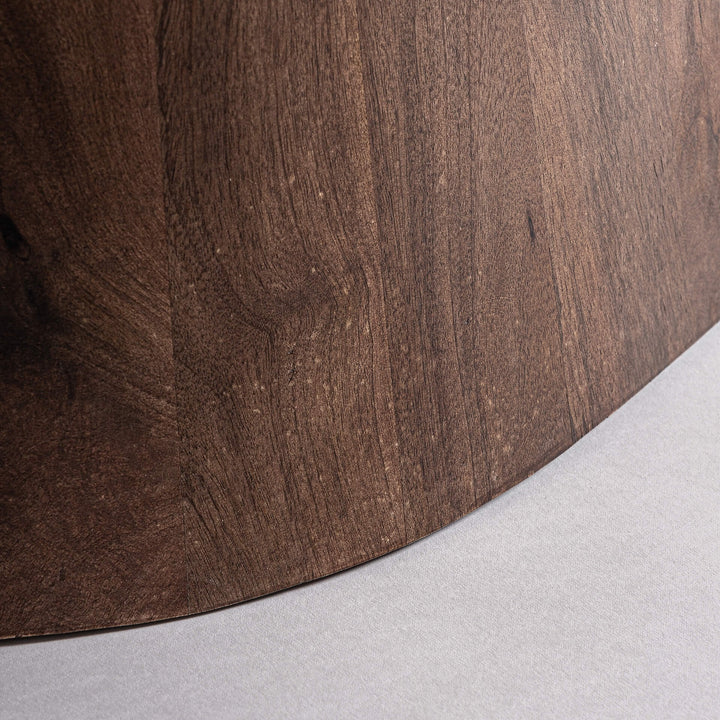 Detail of the curved acacia wood base with smooth finish.