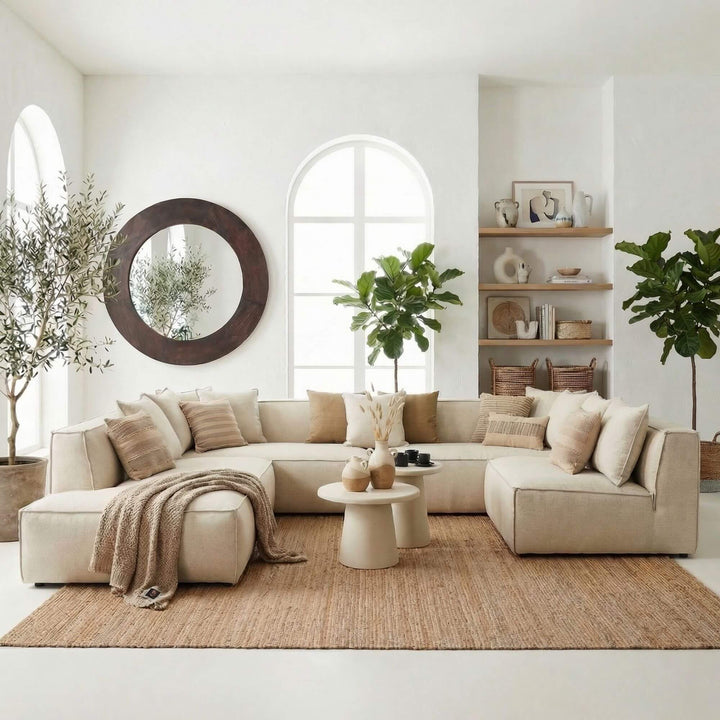 Styled living room setting featuring the Toscana sofa in a bright natural interior with warm neutral decor.