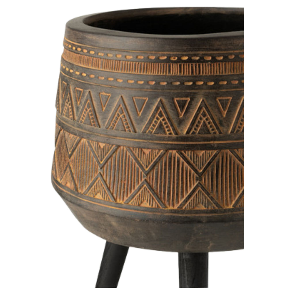 Angled view highlighting the engraved pattern and elevated metal structure.