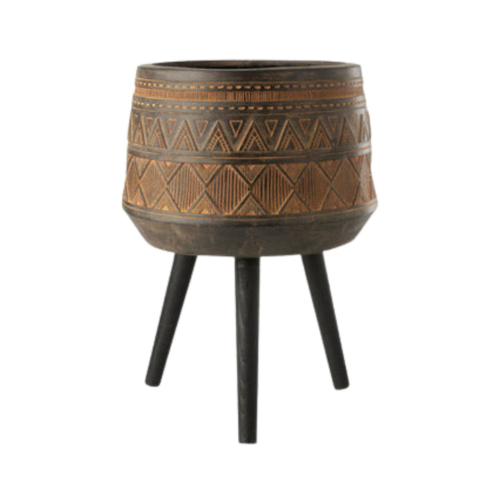 Front view of the Treasu Pot with carved terracotta body and wooden legs.