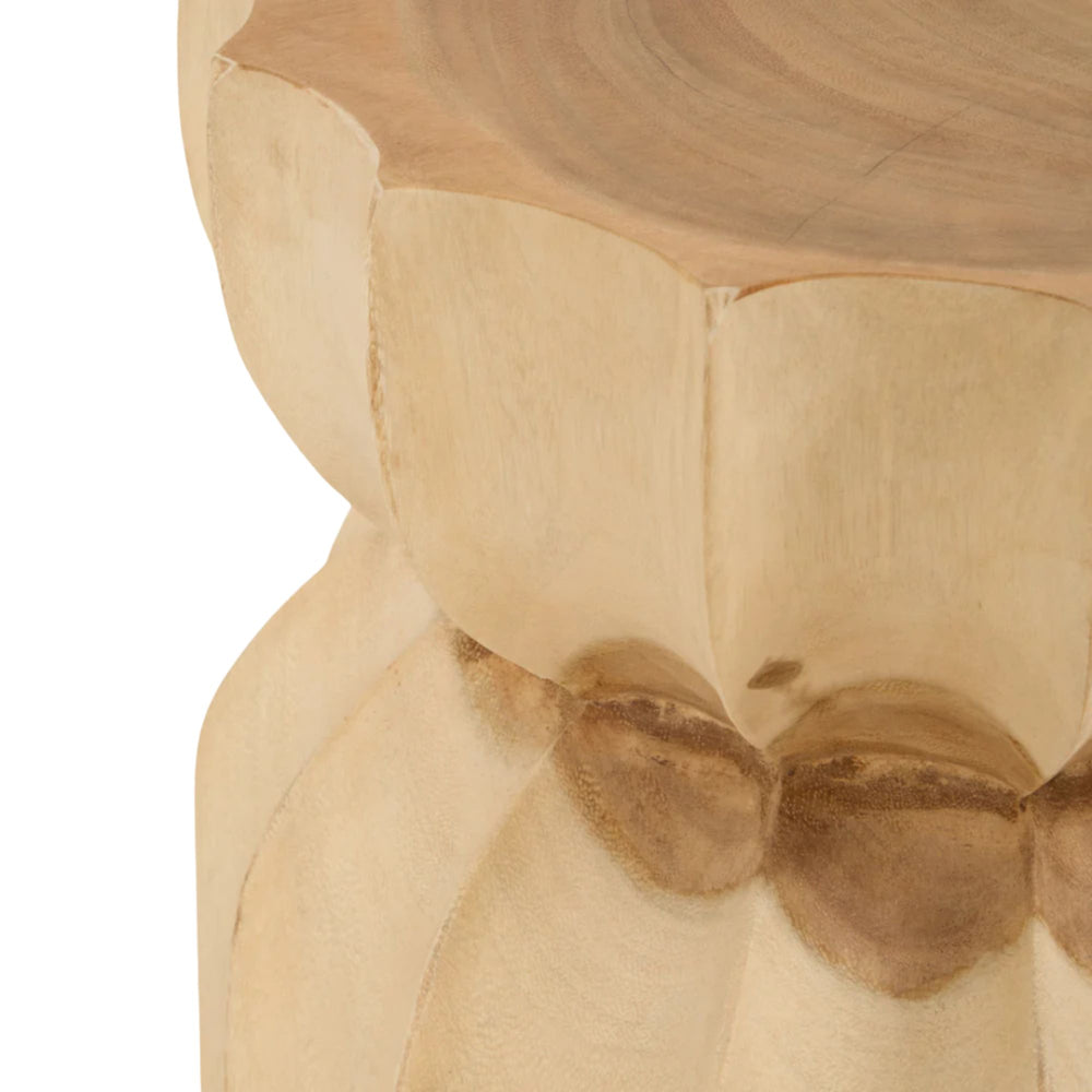 Close-up detail of the suar wood surface showing natural knots and tonal variations.