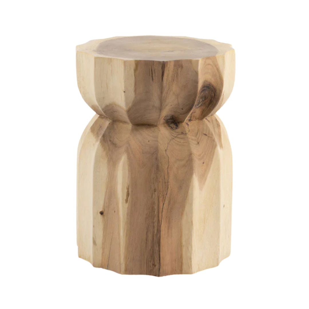 Front view of the Trembesi side table carved from solid suar wood with organic form.