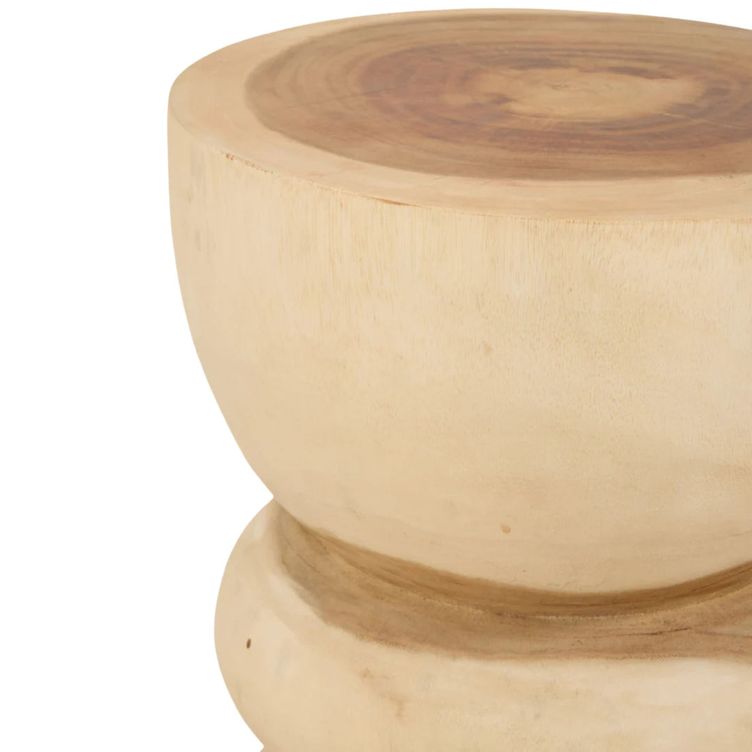 Close-up of the rounded upper section highlighting the smooth carved finish and wood grain details.