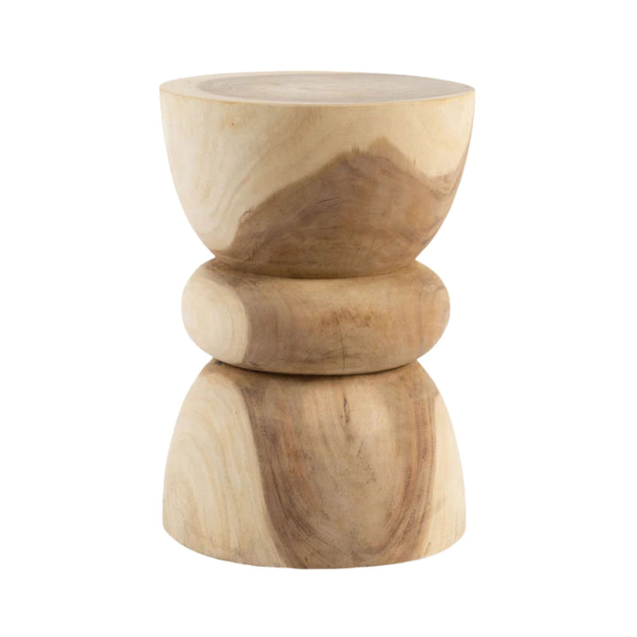 Front view of the Trembesi Totem side table showcasing its sculptural stacked design in natural suar wood.