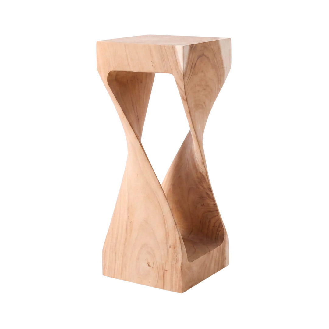 Front view of the Trembesi Twist side table in solid suar wood with a sculptural twisted base