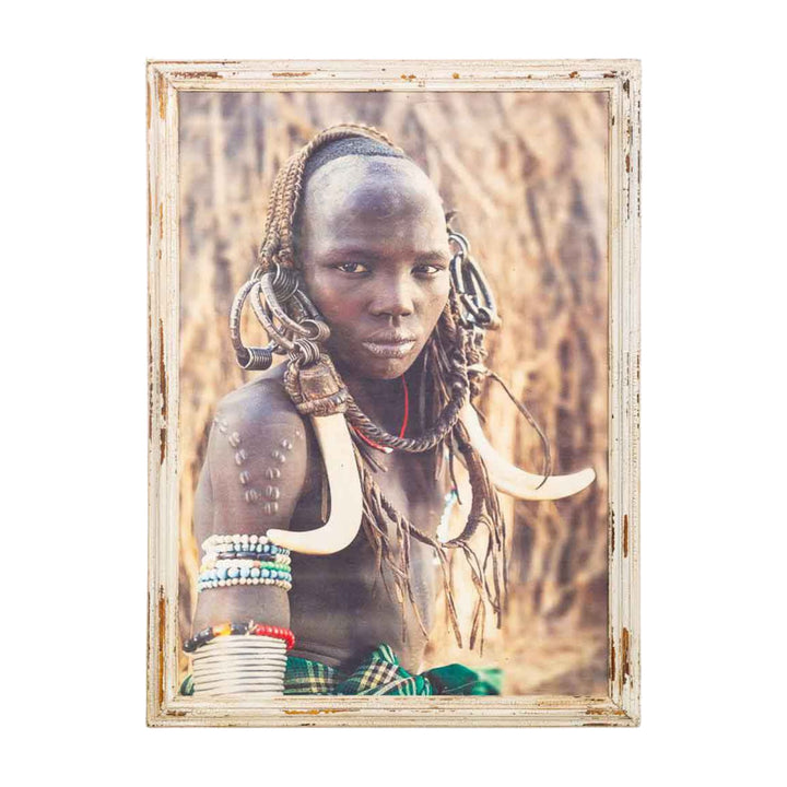 Front view of the Tribe Girl Canvas featuring a powerful tribal portrait with traditional adornments.