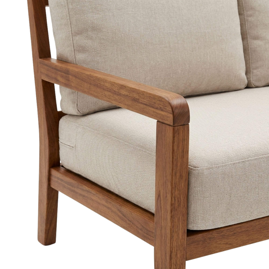 Close-up detail of the iroko wood structure and outdoor upholstery texture.