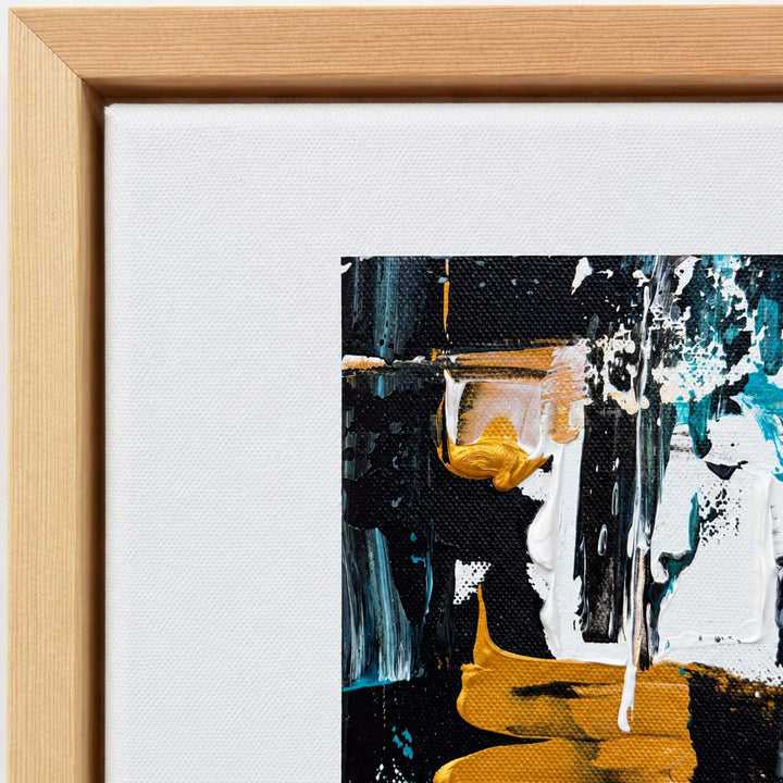 1. Close-up of the Turquoise Noir painting highlighting the artist signature, natural wood frame, and expressive abstract brushwork