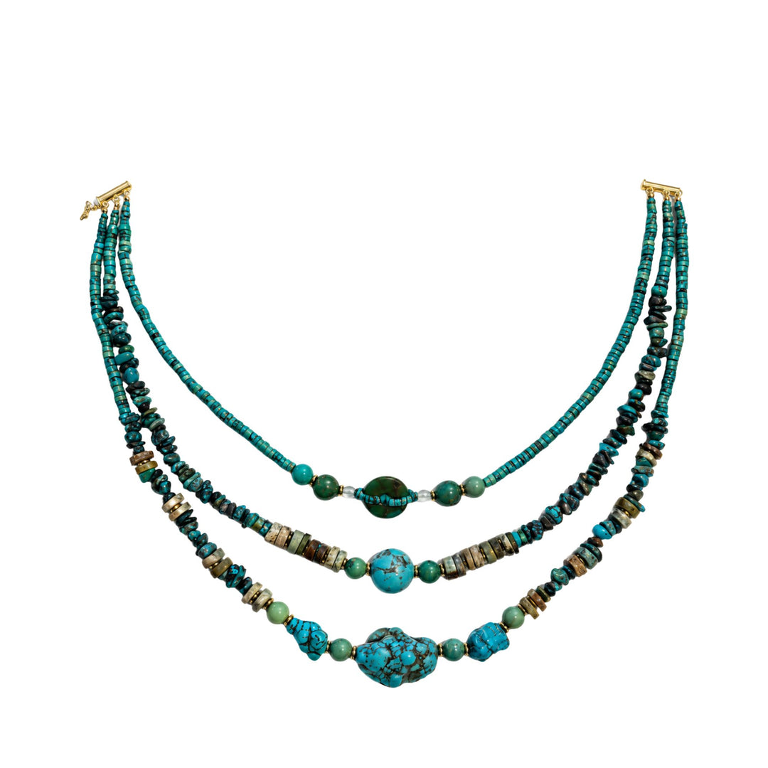 Full view of the Turquoise Nomad Necklace showing its three-strand handcrafted design